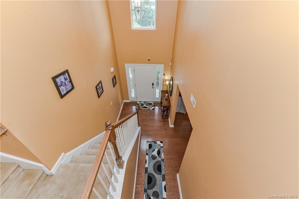 10818 Greenhead View Road Charlotte, NC 28262 - Photo 17 of 39 a view of a livingroom with furniture and stairs