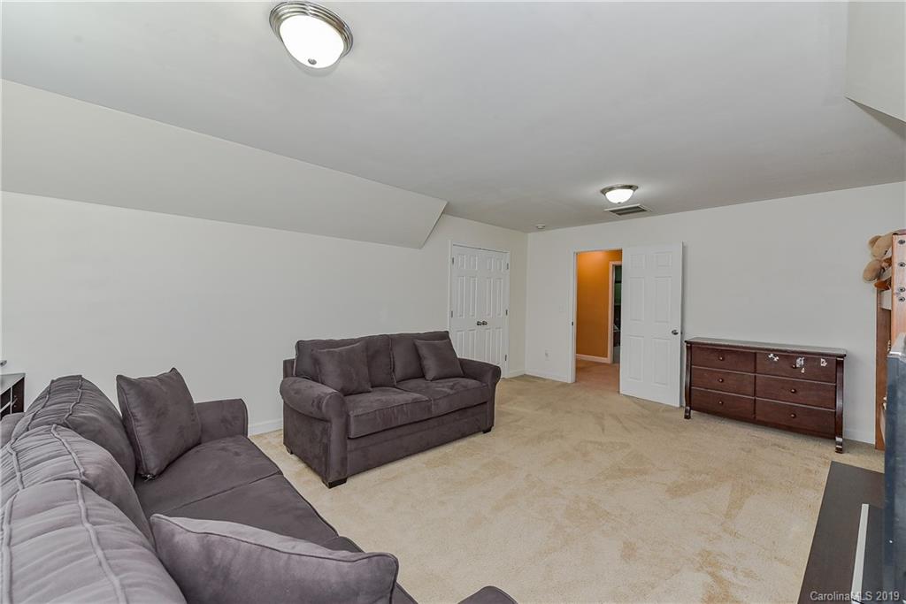 10818 Greenhead View Road Charlotte, NC 28262 - Photo 32 of 39 a living room with furniture