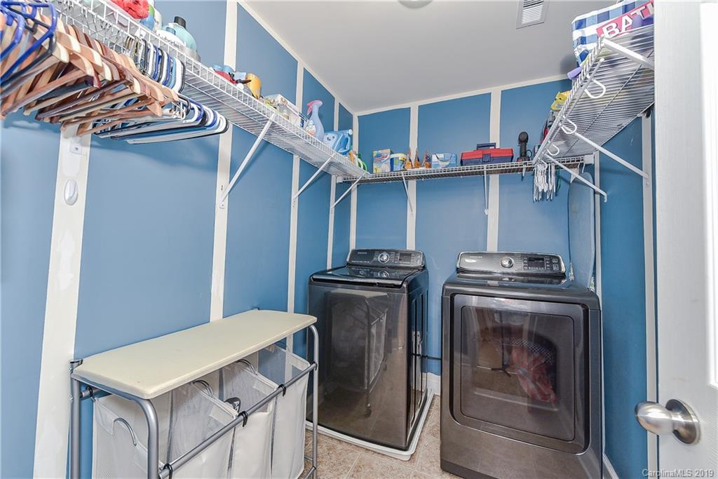 10818 Greenhead View Road Charlotte, NC 28262 - Photo 34 of 39 a utility room with dryer and washer