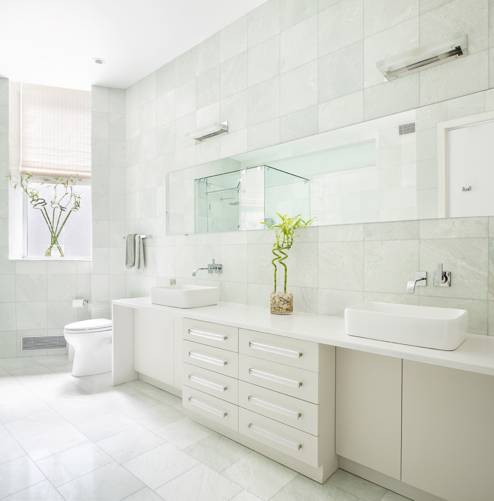 362 West Broadway, Unit 2 Manhattan, NY 10013 - Photo 11 of 13 a bathroom with a sink a toilet and mirror