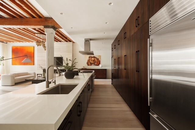 362 West Broadway, Unit 2 Manhattan, NY 10013 - Photo 6 of 13 a kitchen with stainless steel appliances a sink a stove and a refrigerator