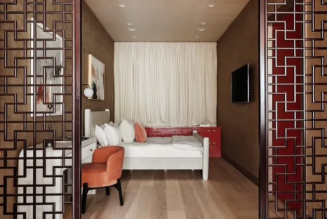 a bedroom with bed and window with window