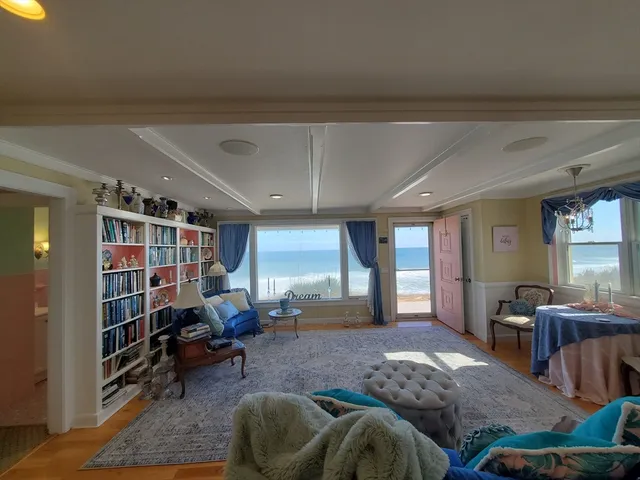 a large kitchen with lots of counter space and stainless steel appliances