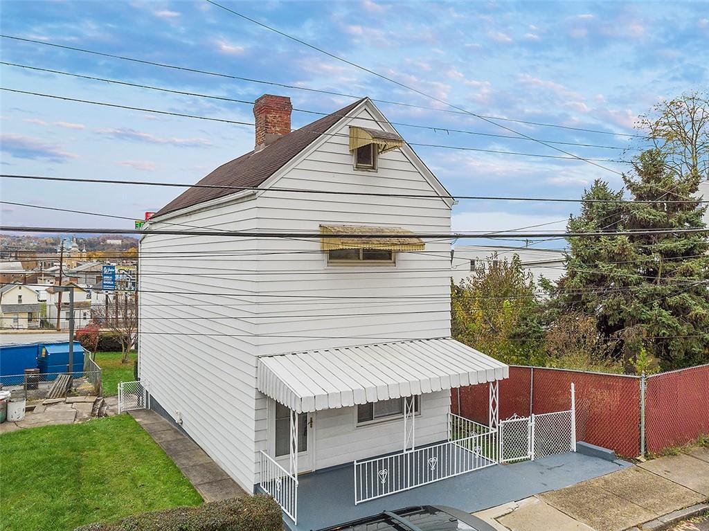 716 School Street McKees Rocks, PA 15136 - Photo 1 of 25 a house view with a backyard space