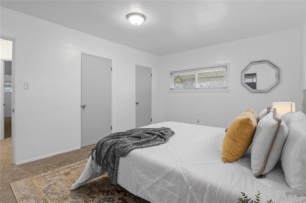 716 School Street McKees Rocks, PA 15136 - Photo 15 of 25 a bedroom with a bed and closet