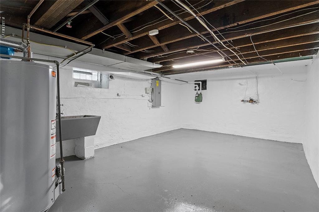 716 School Street McKees Rocks, PA 15136 - Photo 21 of 25 a view of a room with storage
