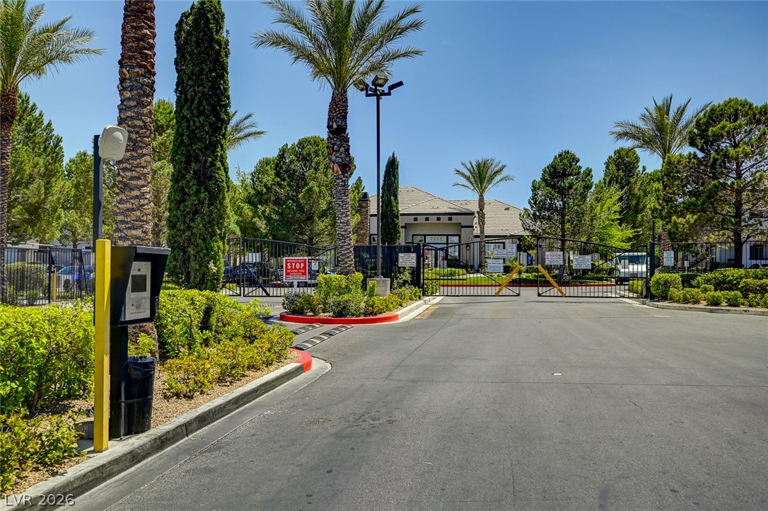 7255 West Sunset Road, Unit 2005 Las Vegas, NV 89113 - Photo 5 of 27 Secure community entrance with lush landscaping welcomes residents home.