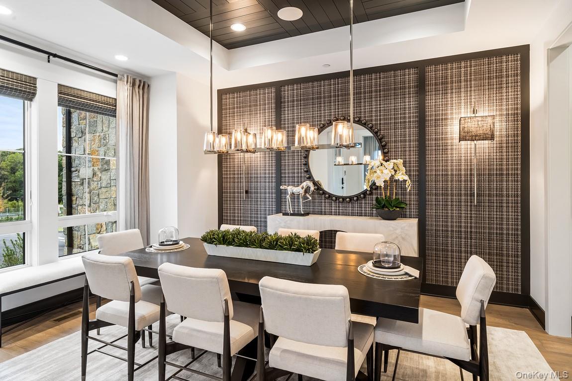 25 Fieldstone, Unit 35 Armonk, NY 10504 - Photo 4 of 16 a view of a dining room with furniture window and outside view