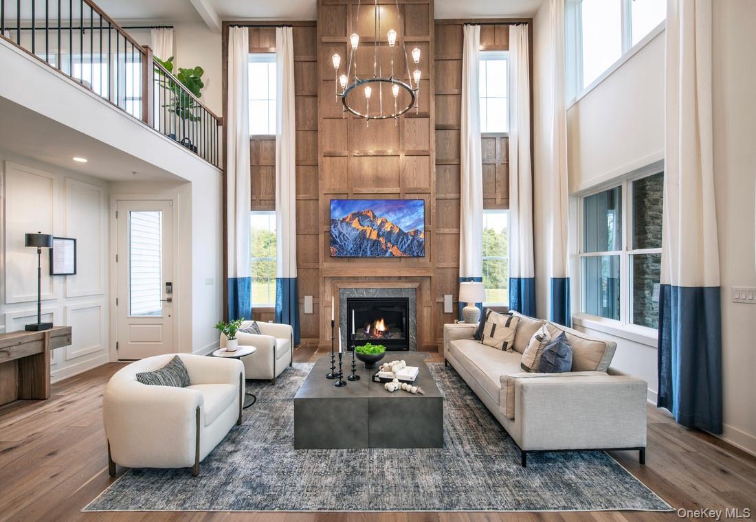 25 Fieldstone, Unit 35 Armonk, NY 10504 - Photo 6 of 16 a living room with furniture and a fireplace