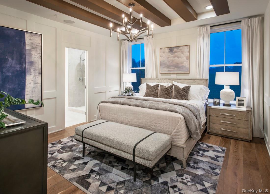 25 Fieldstone, Unit 35 Armonk, NY 10504 - Photo 7 of 16 a bed room with a bed and a couch