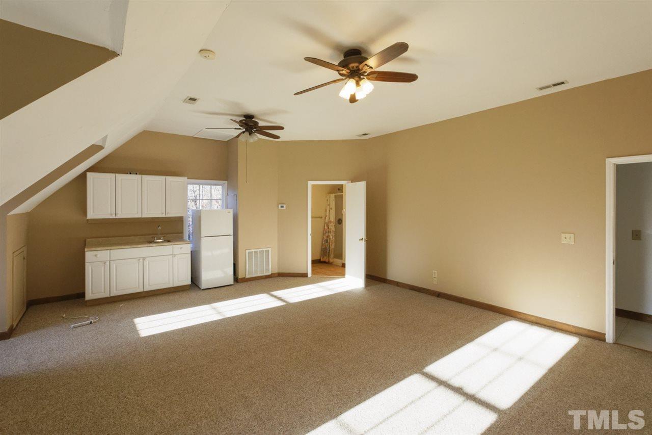 7220 Ridgeline Drive Raleigh, NC 27613 - Photo 10 of 16 This huge room over the detached garage has a bath with walk-in shower and plenty of room for your guests, teen suite or man cave -you choose!