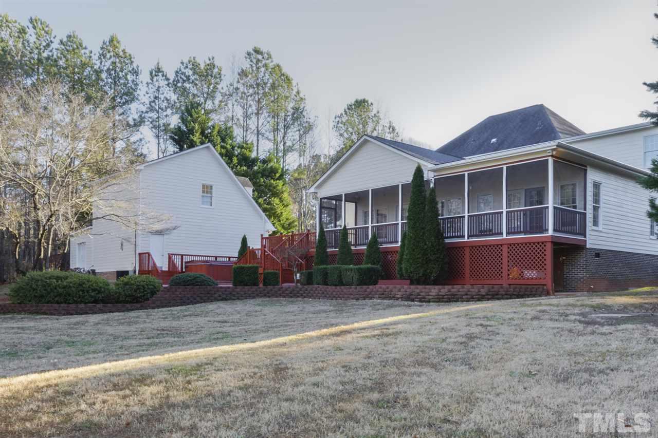 7220 Ridgeline Drive Raleigh, NC 27613 - Photo 14 of 16 This view captures many of the great extra features of this home. From the huge screened porch and deck to the extra 3 car detached garage or workshop and the huge apartment above. This home checks all the boxes and more!