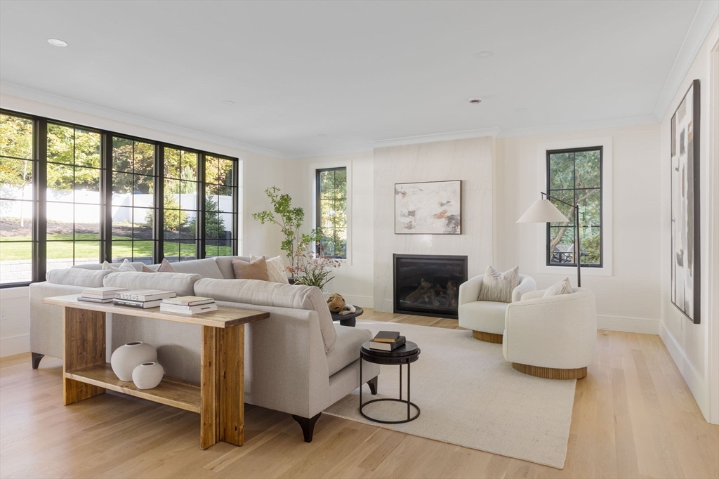 310 Oakland Street Wellesley, MA 02481 - Photo 12 of 33 a view of a livingroom with furniture and a large window