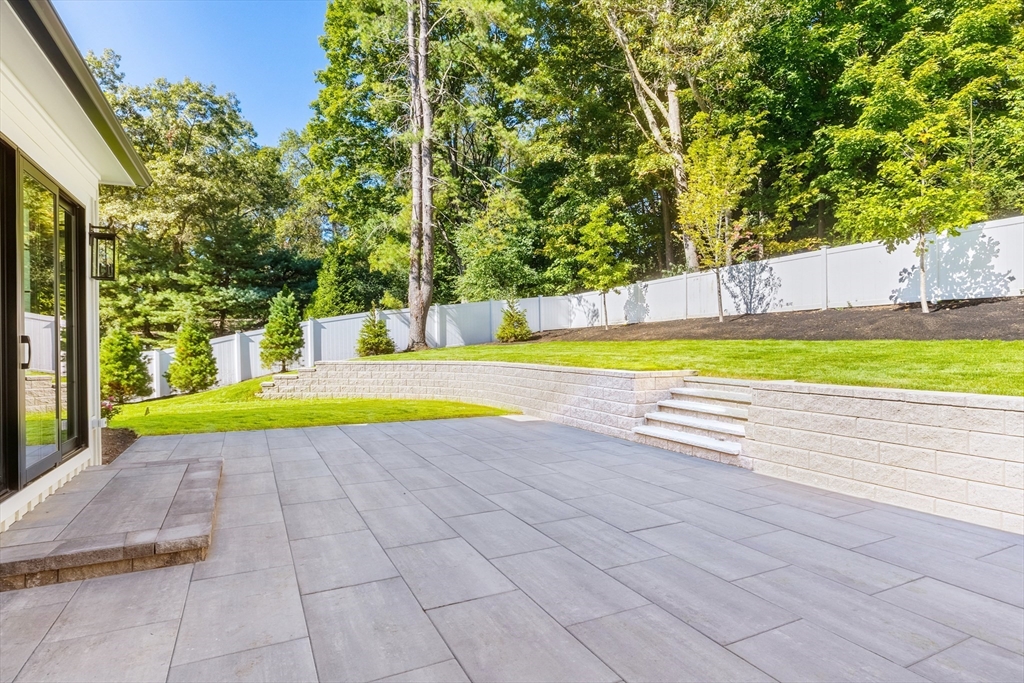 310 Oakland Street Wellesley, MA 02481 - Photo 31 of 33 a view of a swimming pool with a yard and large trees