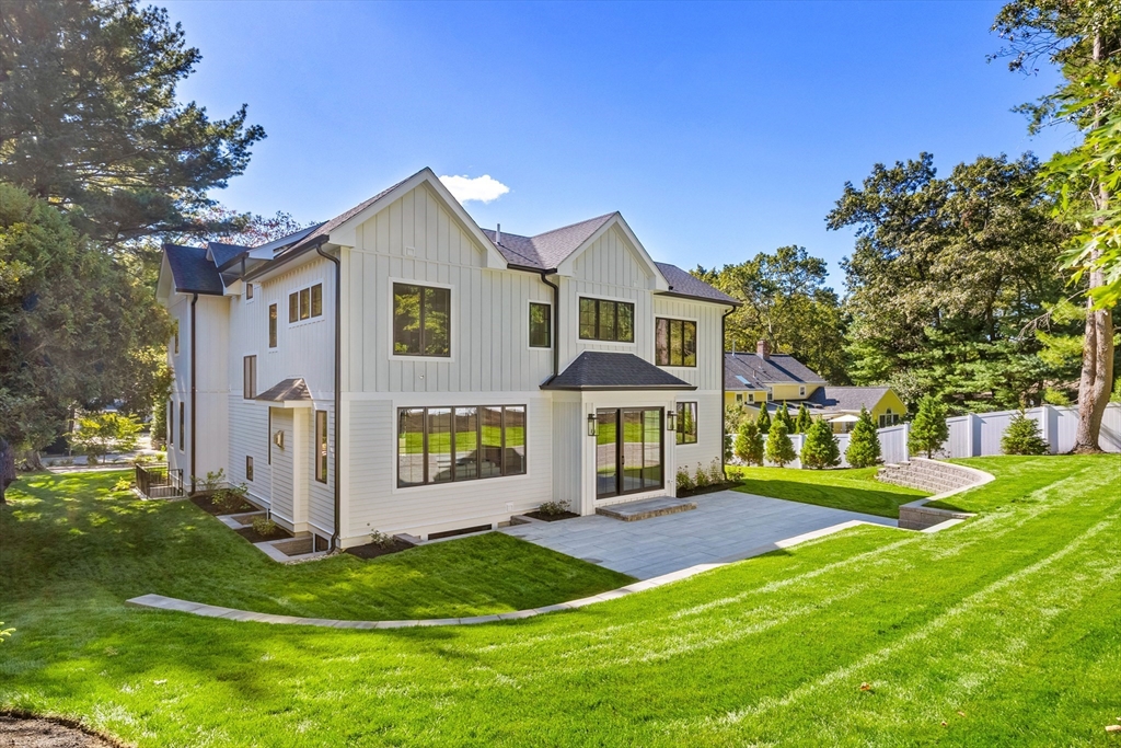 310 Oakland Street Wellesley, MA 02481 - Photo 33 of 33 a front view of a house with a yard