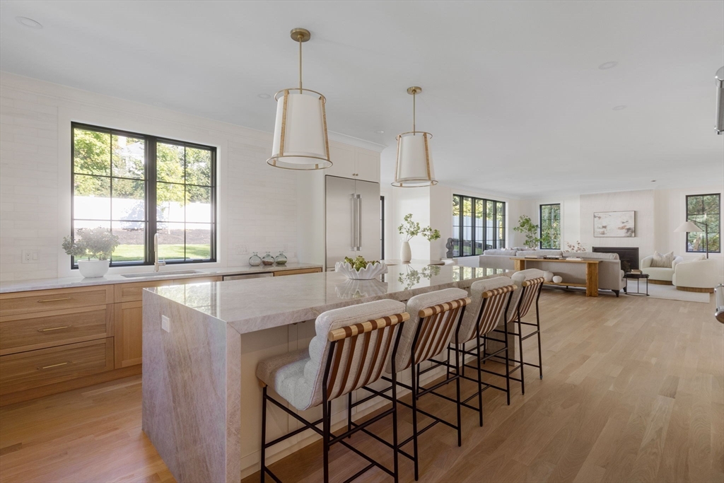 310 Oakland Street Wellesley, MA 02481 - Photo 5 of 33 a view of a dining room with furniture window and outside view