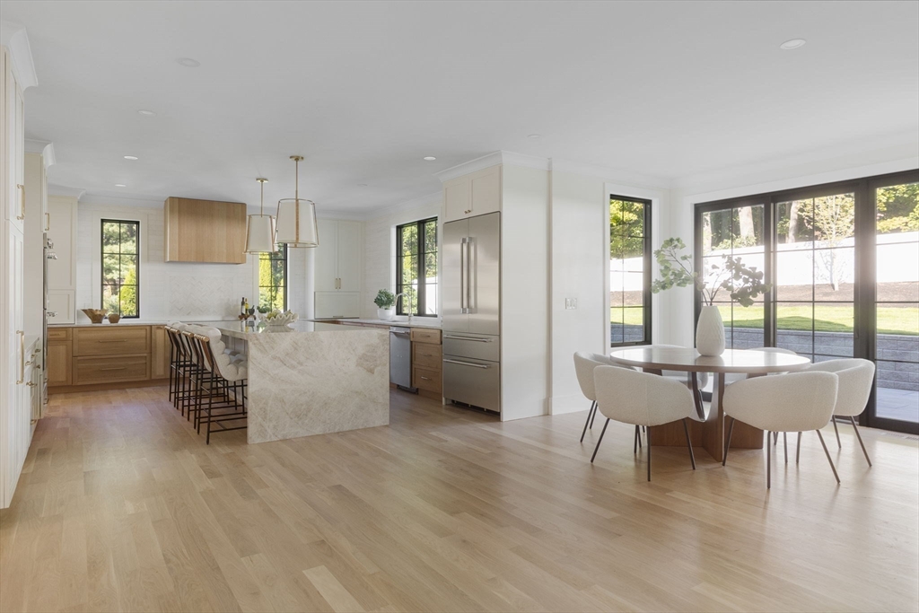 310 Oakland Street Wellesley, MA 02481 - Photo 10 of 33 a living room with furniture and a wooden floor
