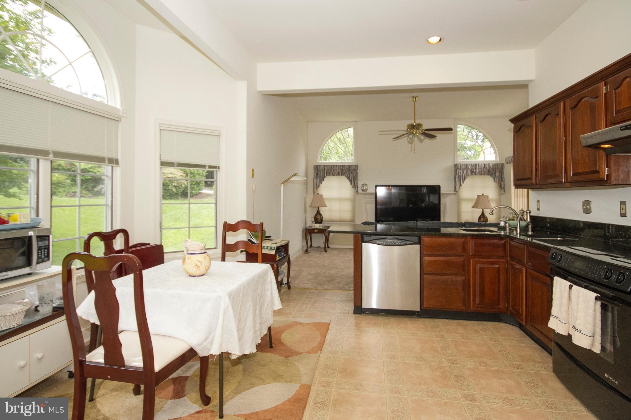 4 Roland Place Bel Air, MD 21014 - Photo 14 of 22 a large kitchen with a table and chairs