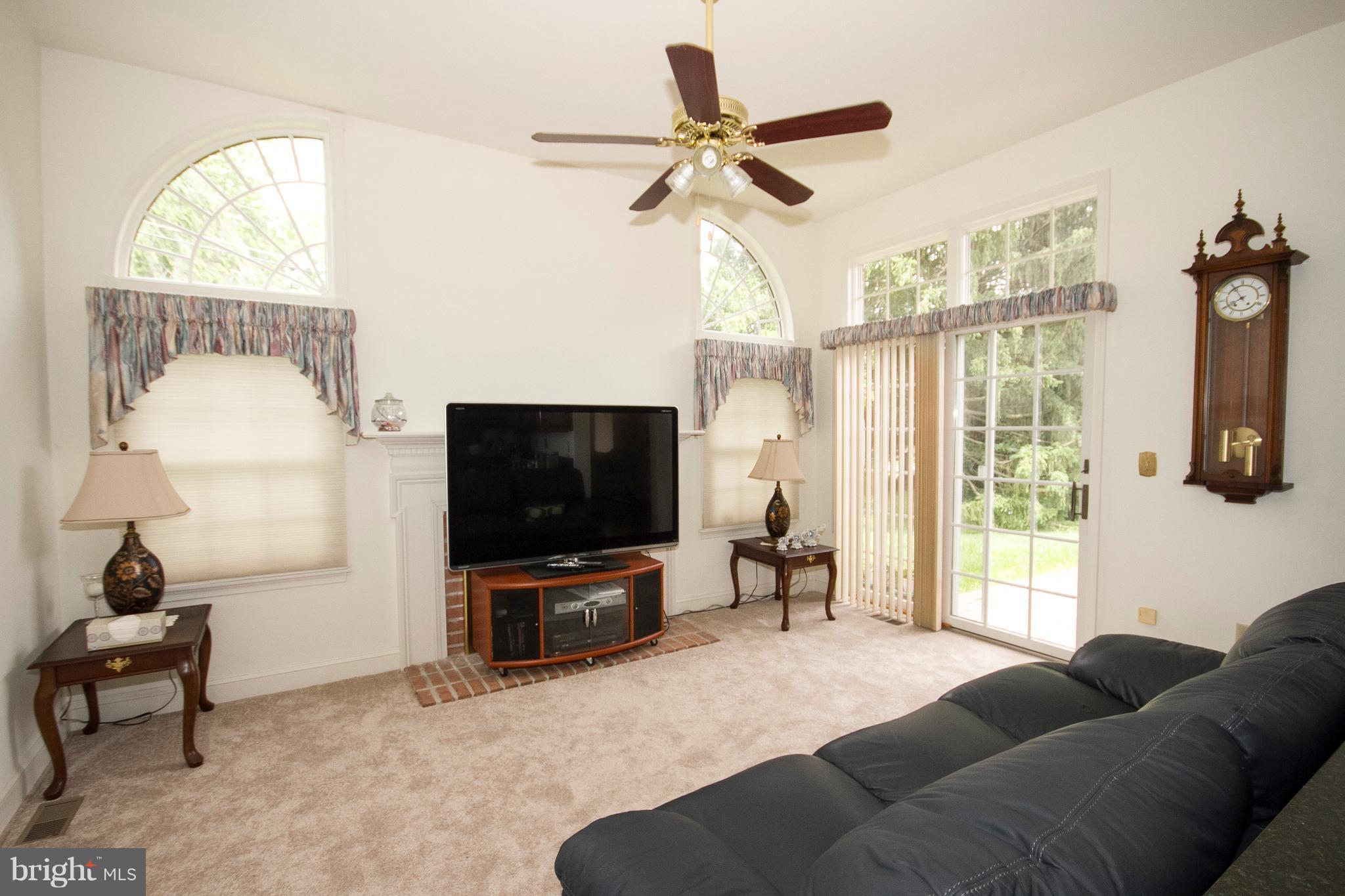 4 Roland Place Bel Air, MD 21014 - Photo 10 of 22 a living room with furniture and a flat screen tv