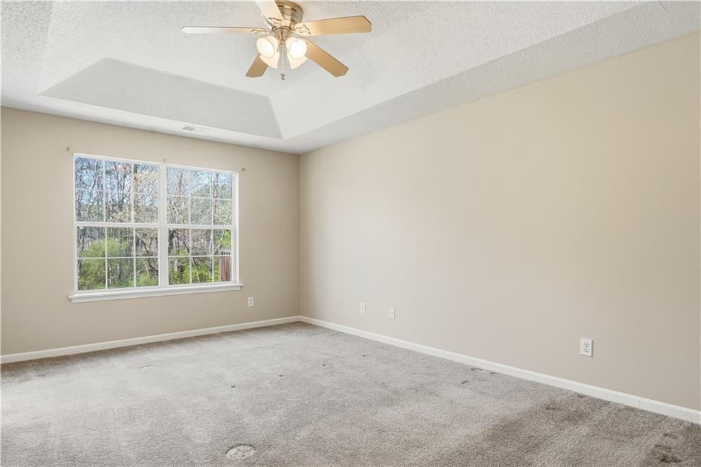 1488 Bellemeade Farms Road Southwest Marietta, GA 30008 - Photo 11 of 31 an empty room with a window