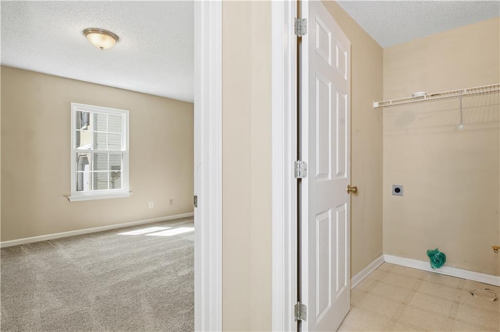 1488 Bellemeade Farms Road Southwest Marietta, GA 30008 - Photo 20 of 31 an empty room that has a window