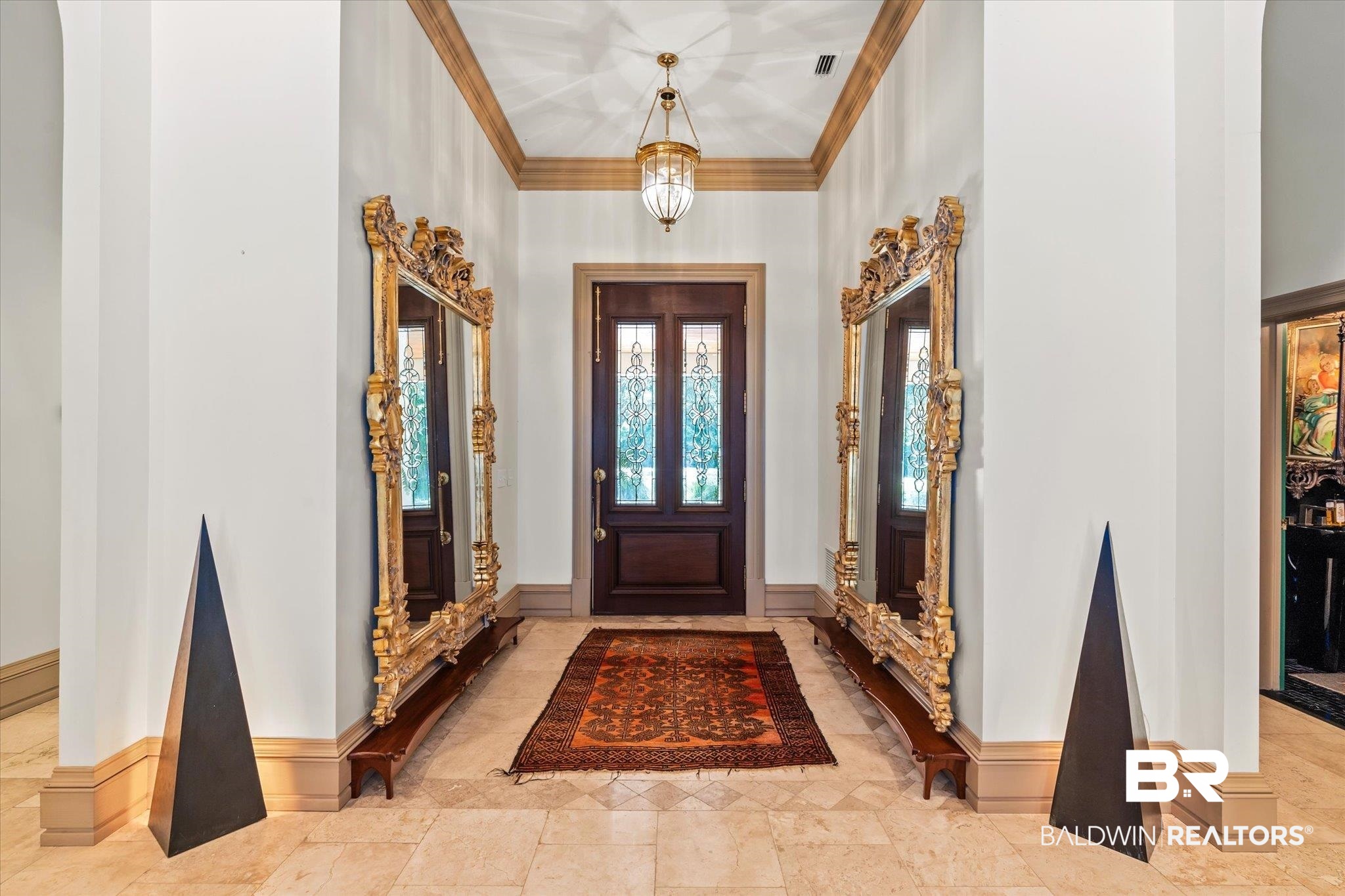 6341 Raintree Road Fairhope, AL 36532 - Photo 4 of 40 Tiled foyer entrance with a towering ceiling and crown molding