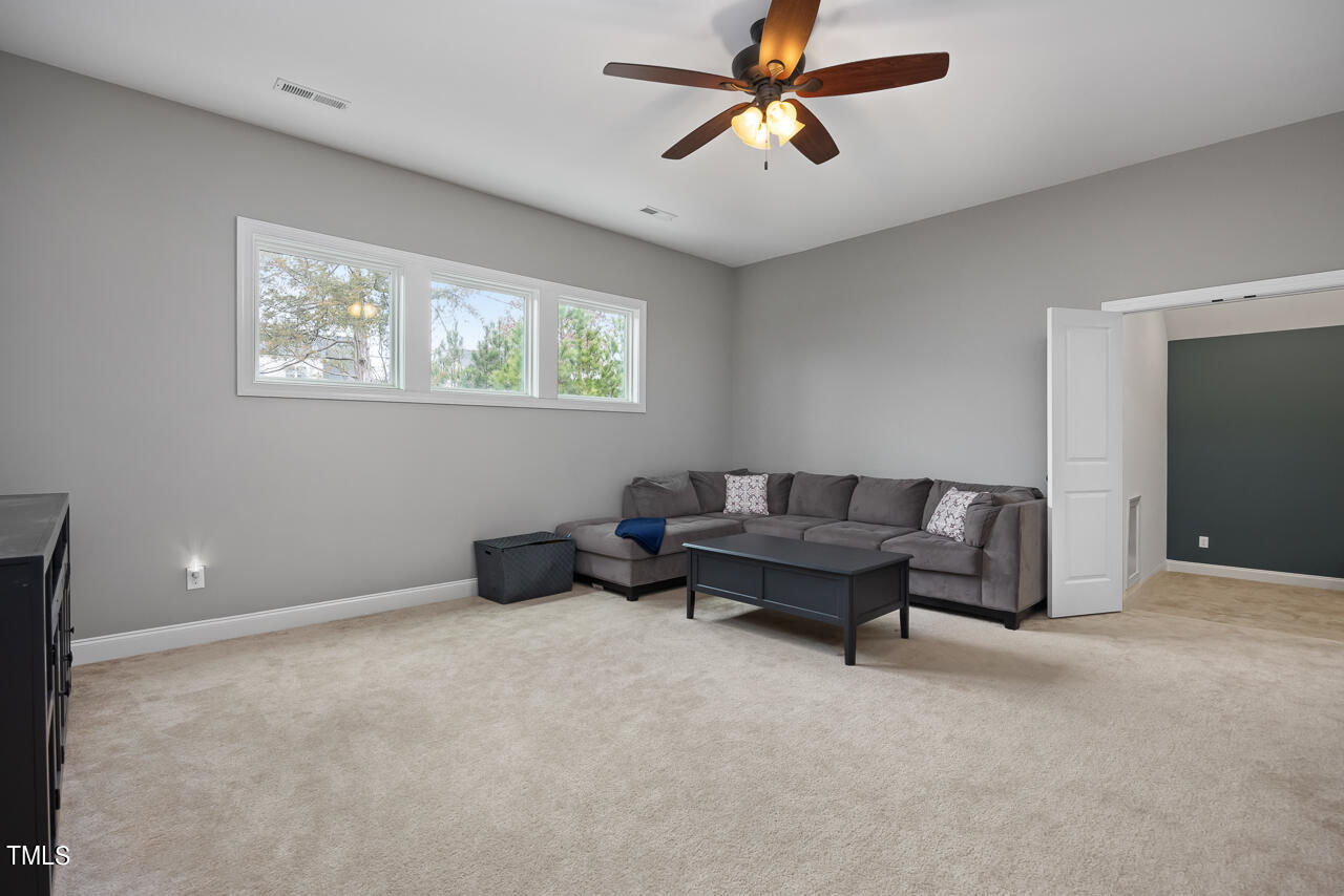5109 Landguard Drive Raleigh, NC 27613 - Photo 27 of 47 a living room with furniture
