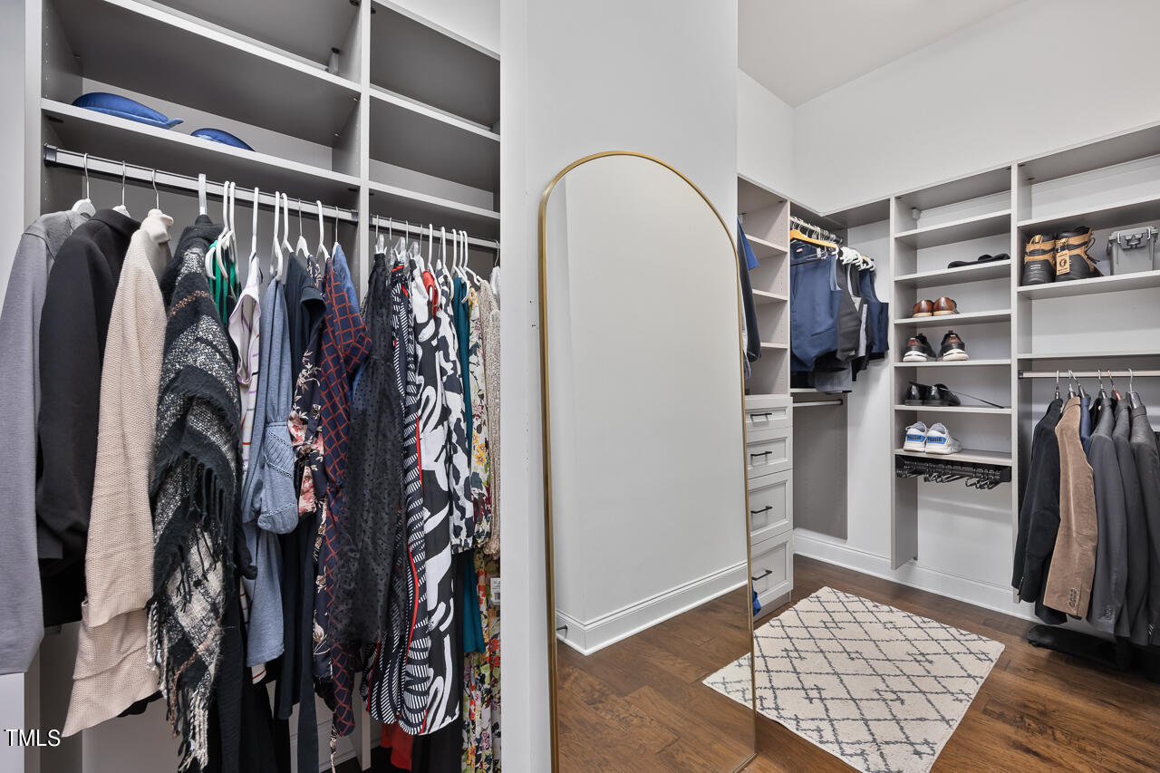 5109 Landguard Drive Raleigh, NC 27613 - Photo 38 of 47 a view of walk in closet with clothes and shoes