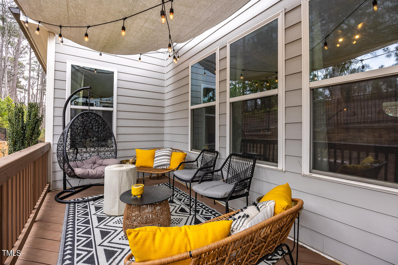 5109 Landguard Drive Raleigh, NC 27613 - Photo 43 of 47 a view of a patio with chairs and table in the patio