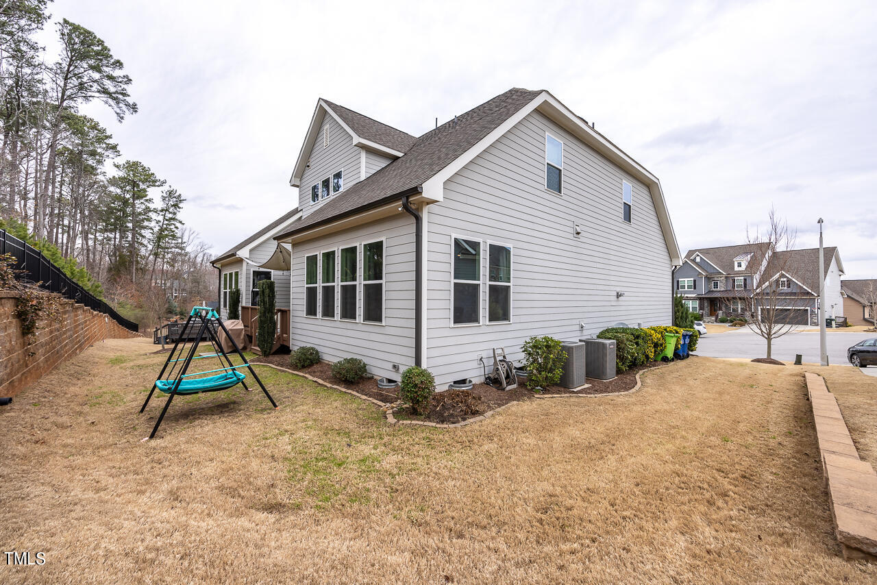 5109 Landguard Drive Raleigh, NC 27613 - Photo 44 of 47 a front view of a house with a yard