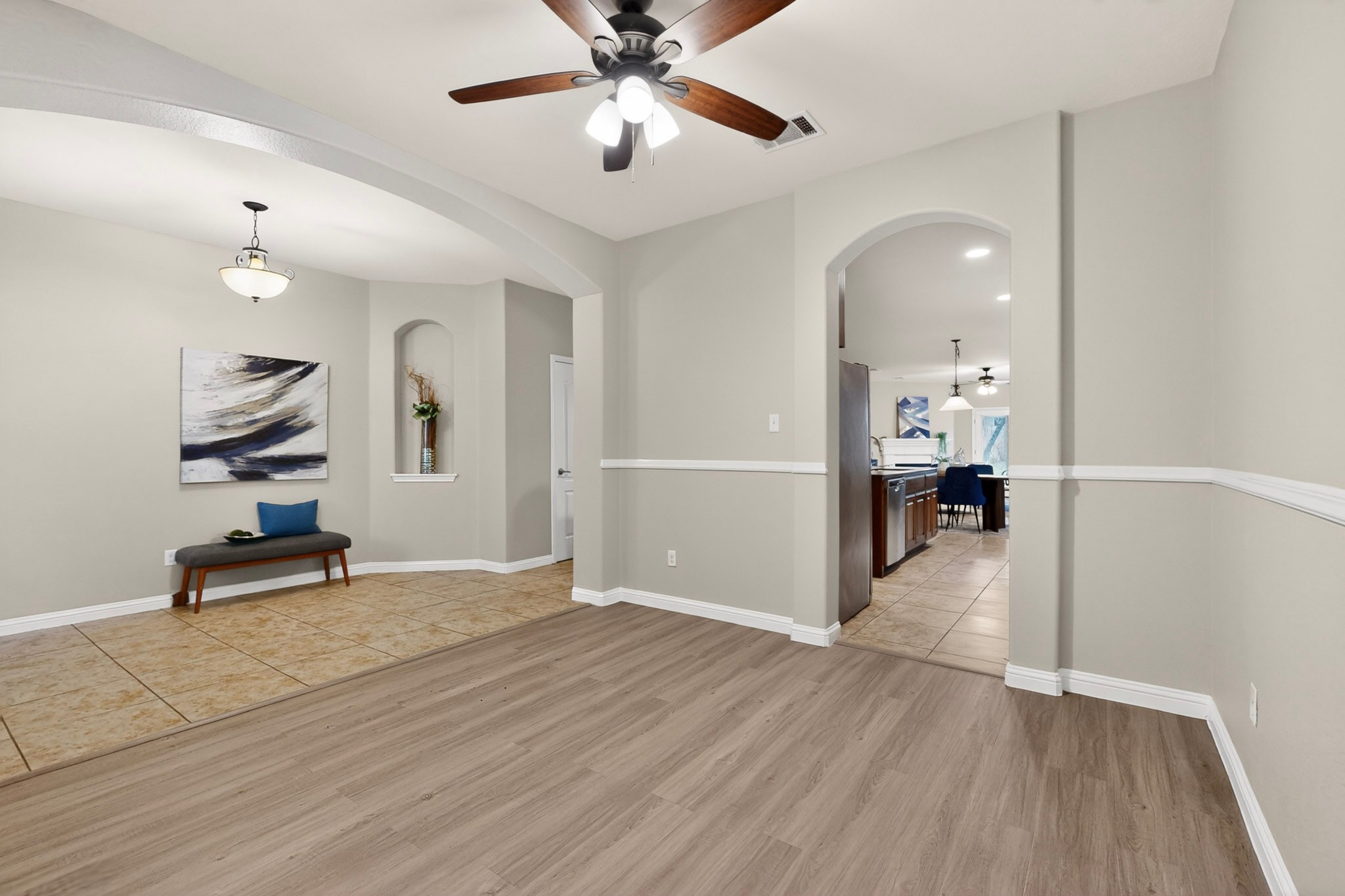 178 Limestone Trail Austin, TX 78737 - Photo 8 of 40 Expansive interior featuring wood-finish flooring, arched doorways, a built-in wall niche, recessed lighting, and a ceiling fan