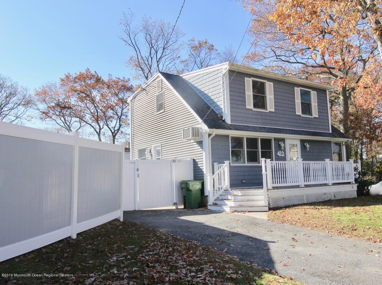 412 Ely Road Neptune Township, NJ 07753 - Photo 1 of 15 a view of a house with a yard