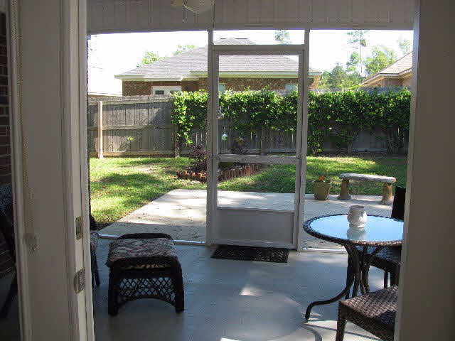7731 Avery Lane Daphne, AL 36526 - Photo 3 of 13 Screened in Porch