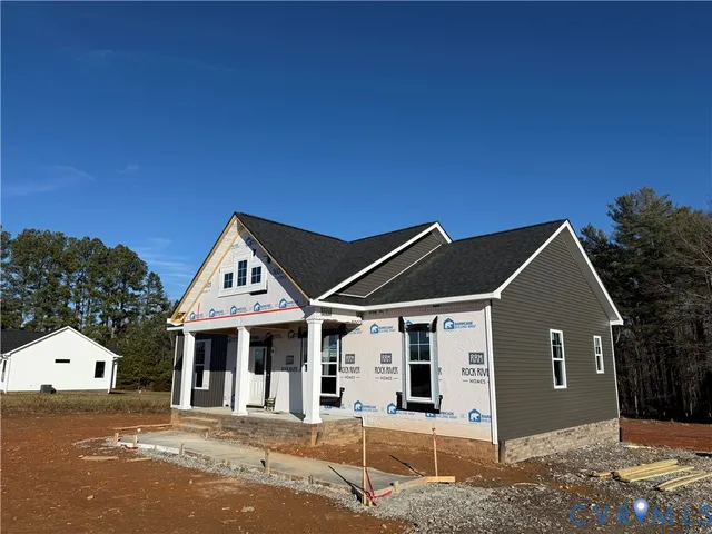 a front view of a house with a garage