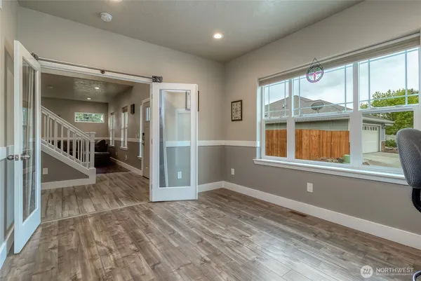 a view of livingroom with furniture and windows