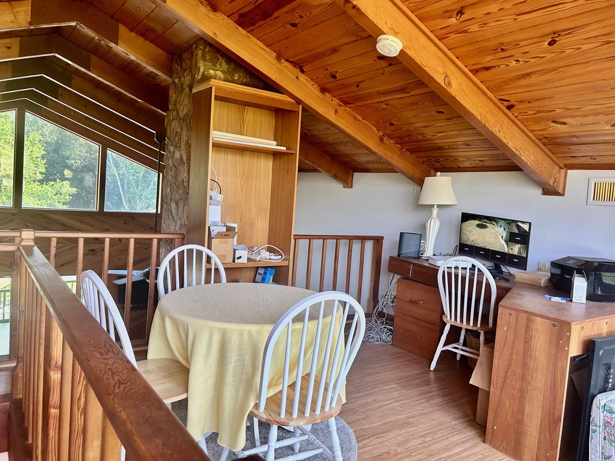 17534 103rd Terrace North Jupiter, FL 33478 - Photo 12 of 25 a view of balcony with furniture and wooden floor