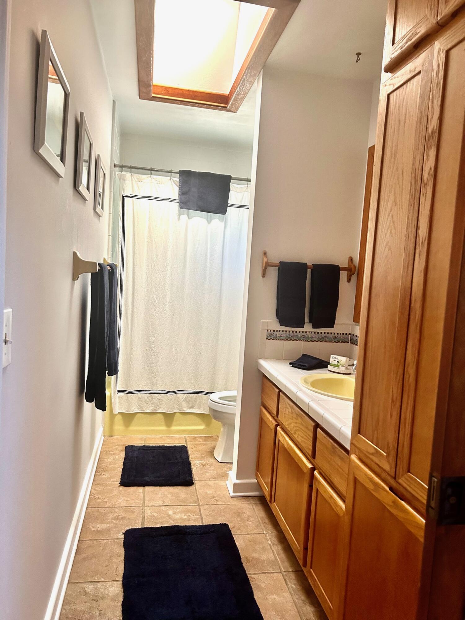 17534 103rd Terrace North Jupiter, FL 33478 - Photo 15 of 25 a view of walk in closet with clothes and shoes