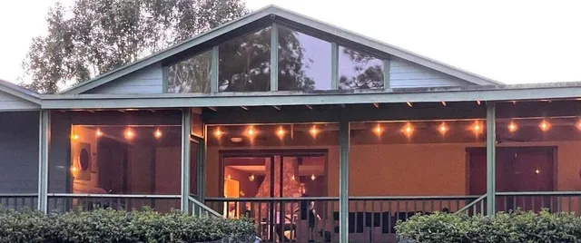 a view of a house with a small yard