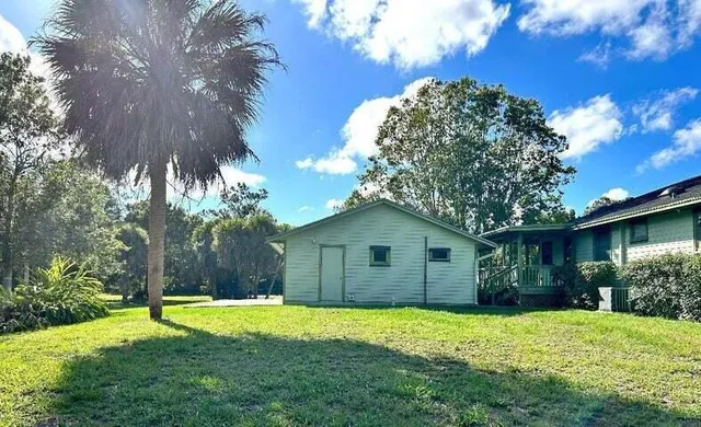 a house view with a garden space