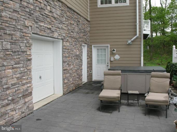 2471 Apple Pie Ridge Road Winchester, VA 22603 - Photo 23 of 30 Patio with Hot Tub & 3rd Garage Bay