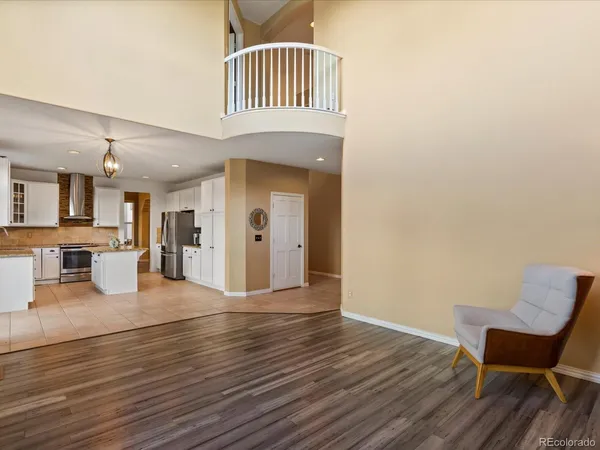 a view of kitchen with furniture and large window