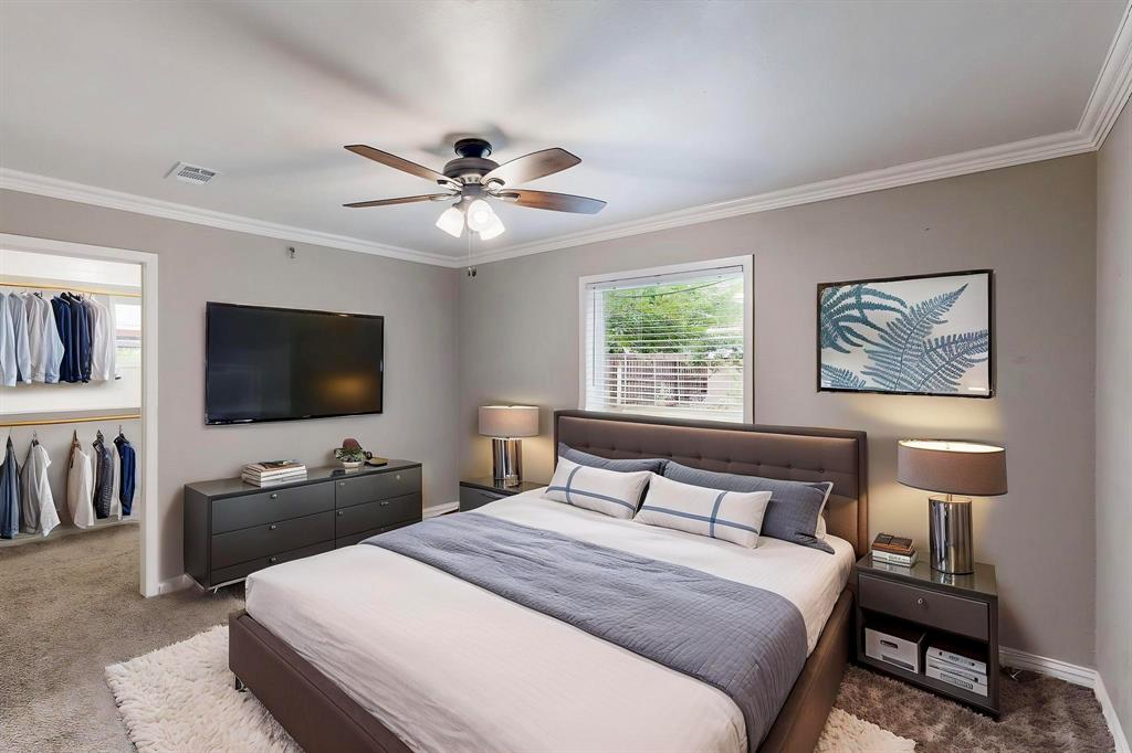 3264 Northaven Road Dallas, TX 75229 - Photo 14 of 35 *Virtually staged* Carpeted bedroom with a closet, a walk in closet, ornamental molding, baseboards, and a ceiling fan