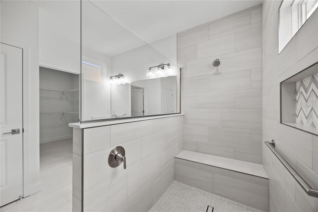 6702 Southwest 10th Lane Gainesville, FL 32607 - Photo 17 of 28 a bathroom with a shower