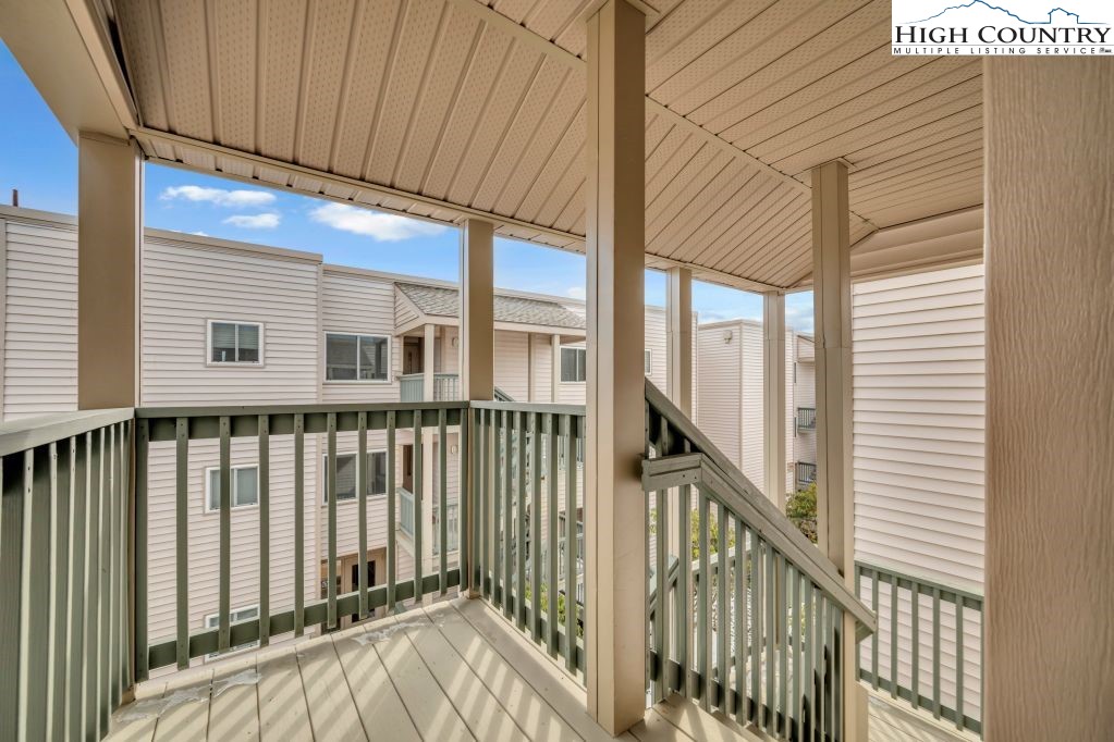 301 Pinnacle Inn Road, Unit 4314 Beech Mountain, NC 28604 - Photo 23 of 39 a view of a balcony with wooden floor