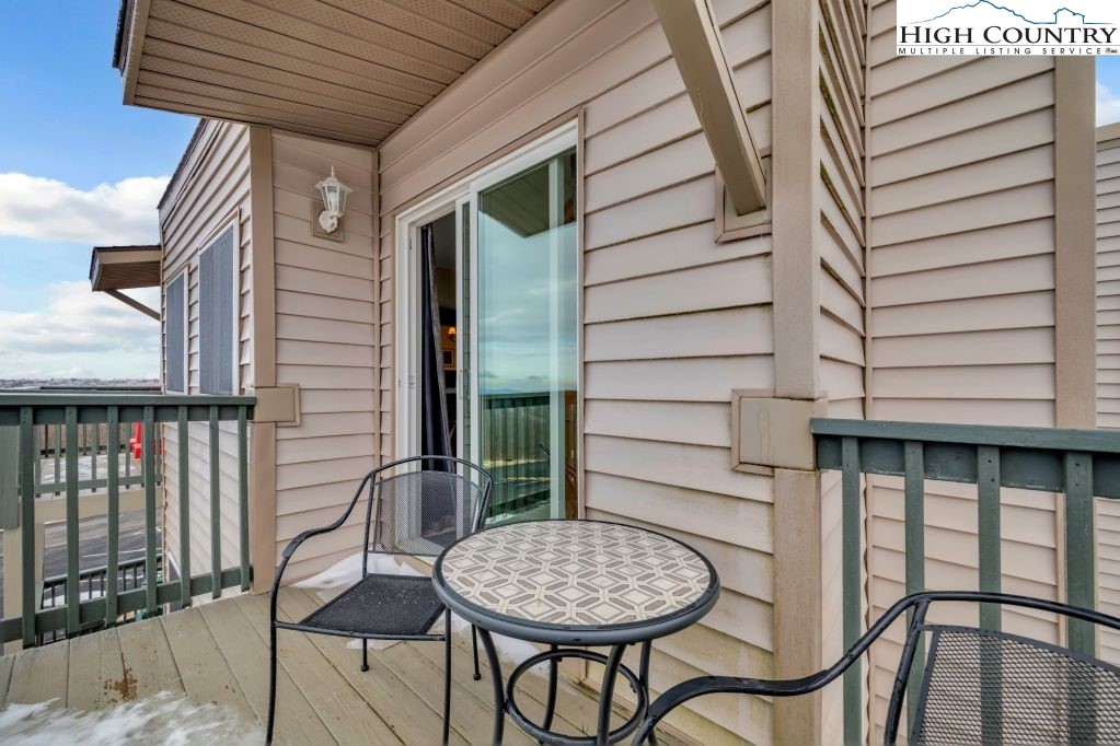 301 Pinnacle Inn Road, Unit 4314 Beech Mountain, NC 28604 - Photo 3 of 39 a view of entryway with a table and chair