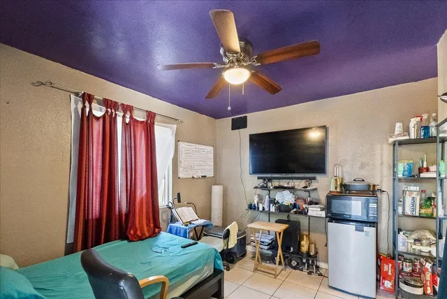 a view of a dining room with furniture and a table