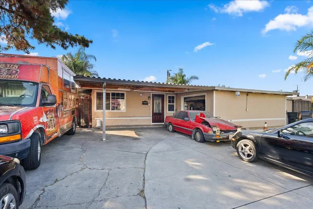 a car parked in front of a house