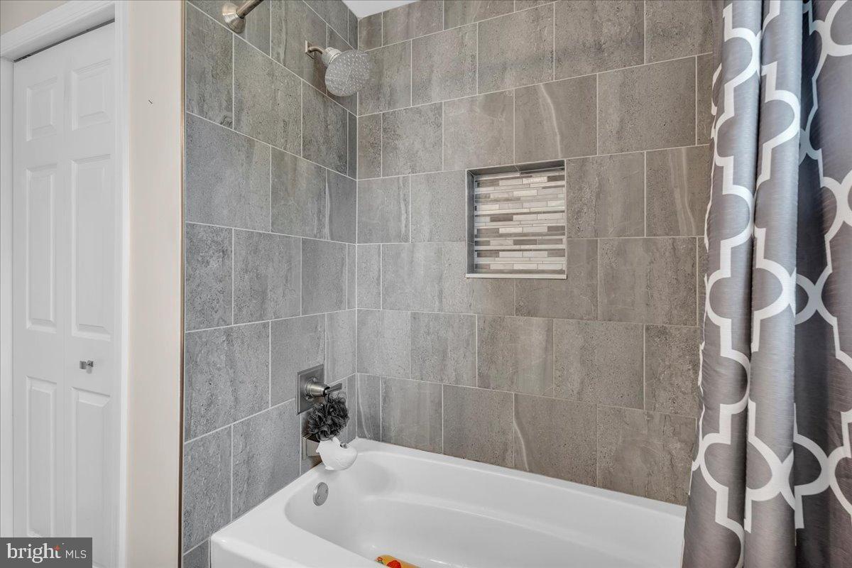 20 Longhurst Road Marlton, NJ 08053 - Photo 18 of 28 Hallway bathroom with modern tile accents