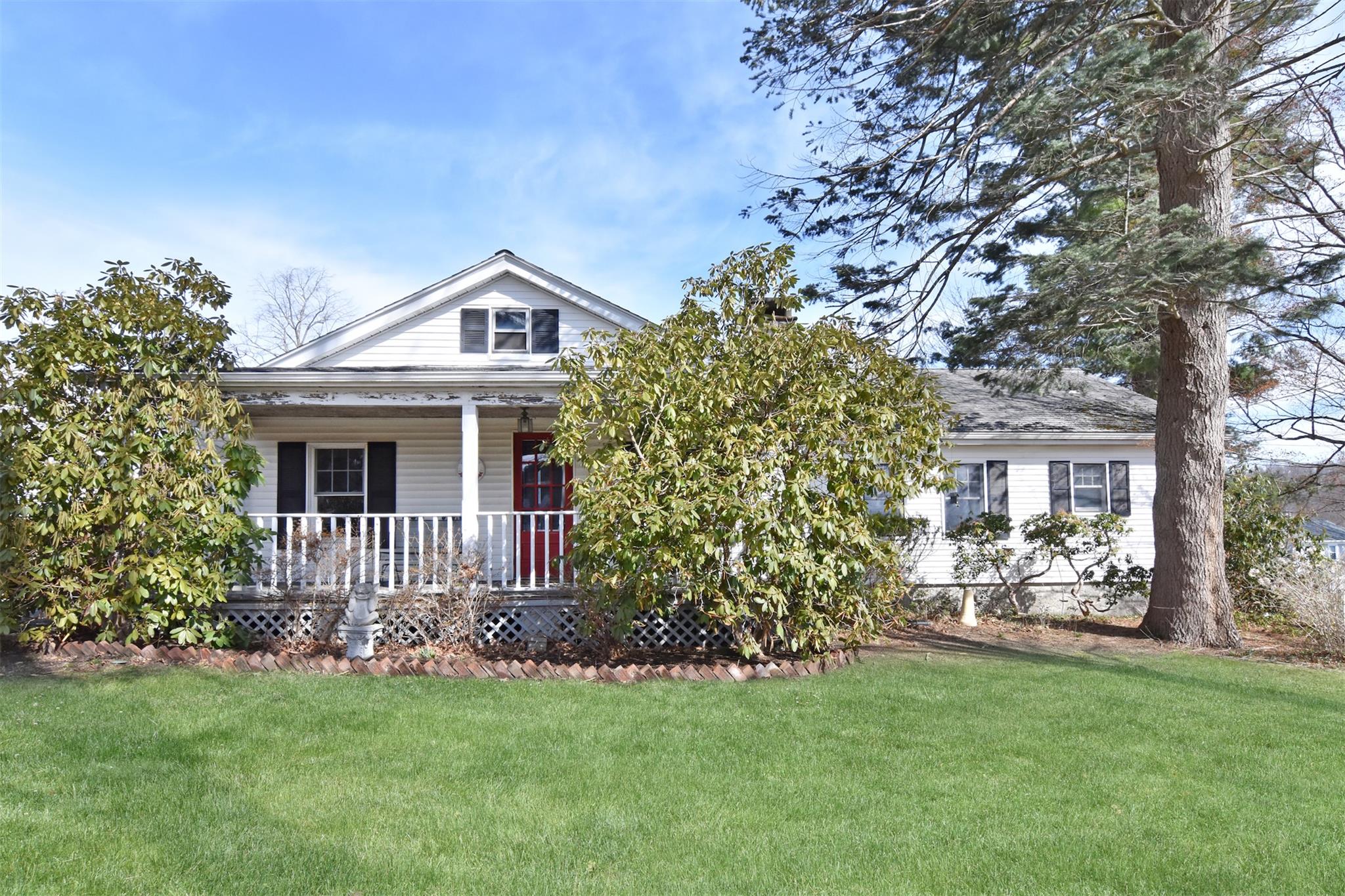 8 Circle Drive Carmel, NY 10512 - Photo 1 of 1 View of front of property with a front lawn and covered porch