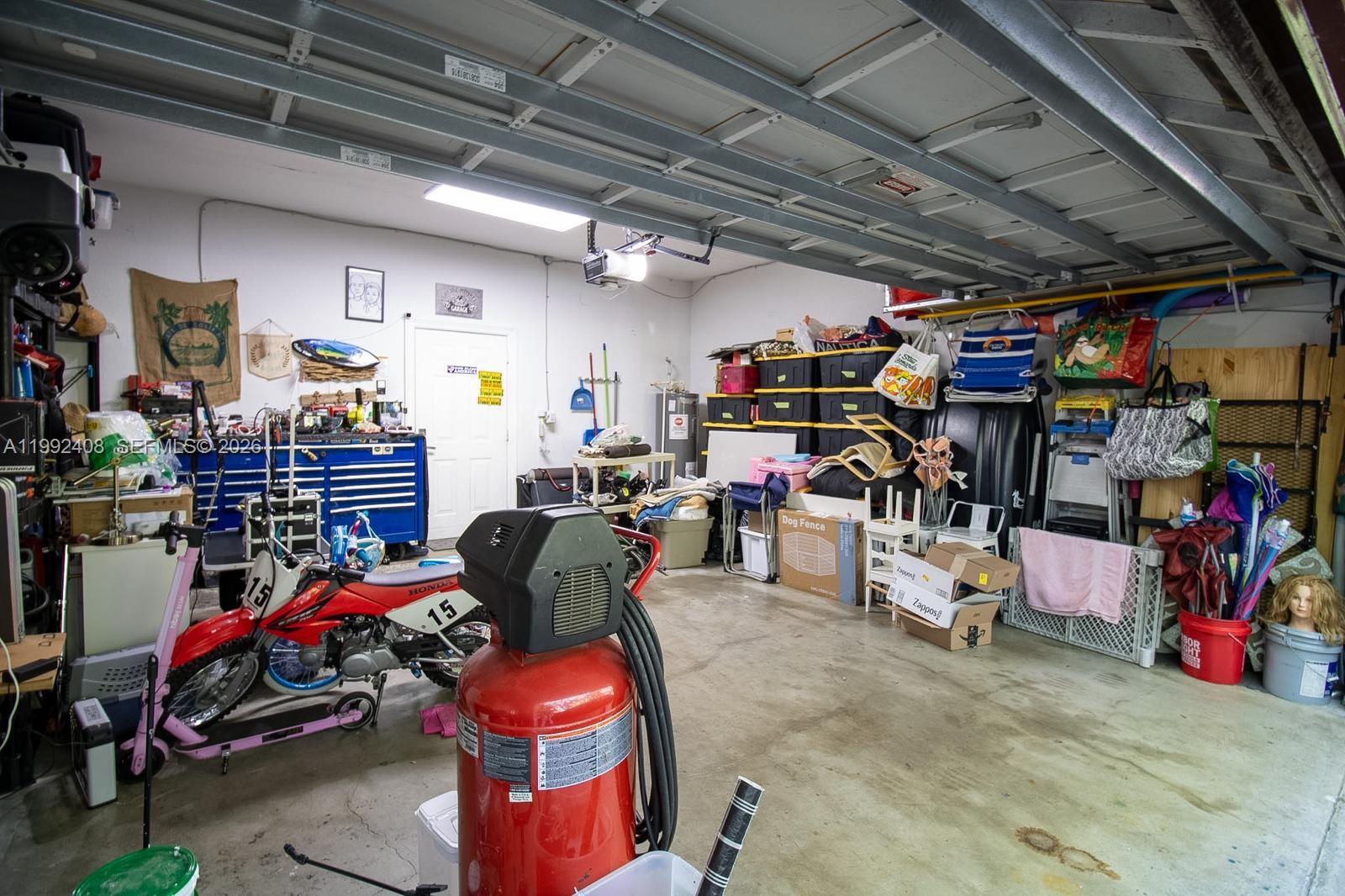 2607 Southwest 99th Way Miramar, FL 33025 - Photo 35 of 50 a view of a storage room with racks